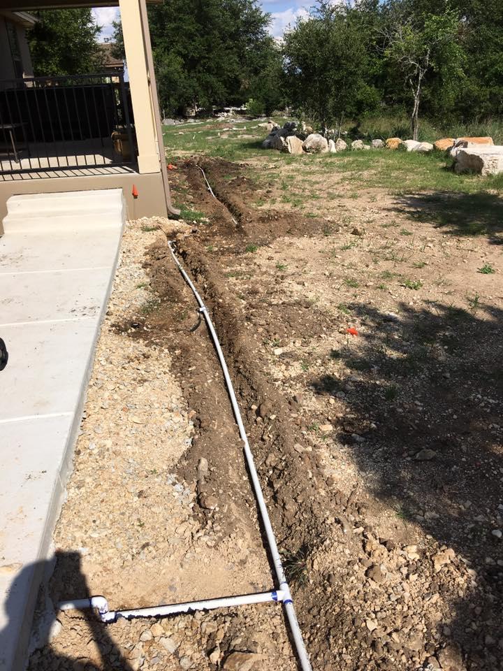 Irrigation line installation at a New Braunfels home